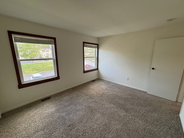 1163 Marquette Ct, Rochester Hills, MI 48307 - empty room with carpet floors, baseboards, and a smoke detector