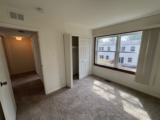 1163 Marquette Ct, Rochester Hills, MI 48307 - unfurnished bedroom with light colored carpet, a closet, and baseboards