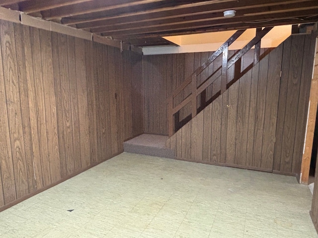 1163 Marquette Ct, Rochester Hills, MI 48307 - basement featuring wooden walls and light flooring
