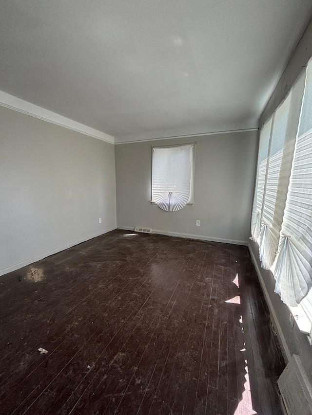 16828 W Chicago St, Detroit, MI 48228 - empty room featuring hardwood / wood-style flooring, ornamental molding, and baseboards