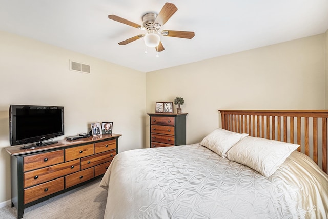 5489 Hidden Oak Cir, Linden, MI 48451 - bedroom with light colored carpet and a ceiling fan