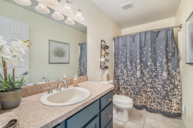 5489 Hidden Oak Cir, Linden, MI 48451 - full bathroom with tile patterned flooring, toilet, vanity, and a shower with curtain