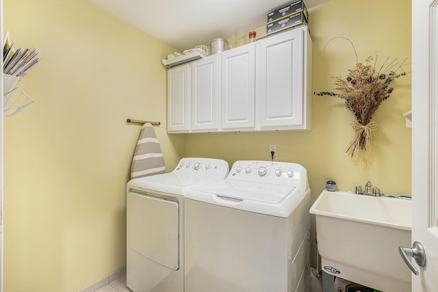 5489 Hidden Oak Cir, Linden, MI 48451 - clothes washing area featuring cabinet space and washing machine and clothes dryer