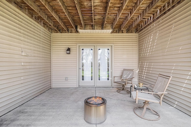 5489 Hidden Oak Cir, Linden, MI 48451 - view of patio / terrace featuring french doors