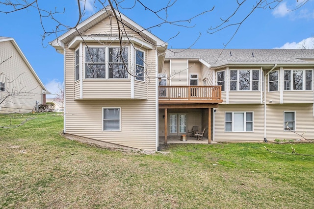 5489 Hidden Oak Cir, Linden, MI 48451 - rear view of house featuring a wooden deck, a yard, a patio area, and french doors