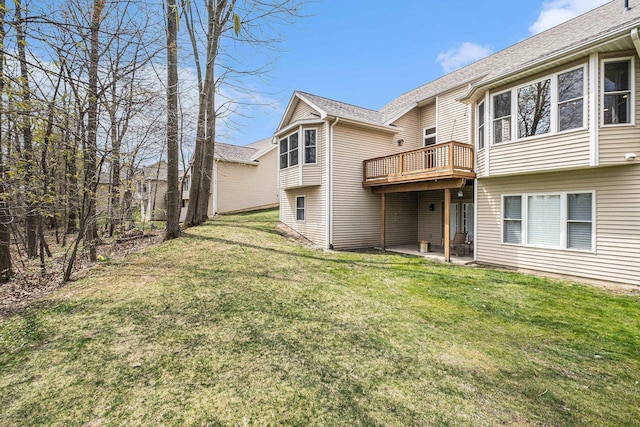 5489 Hidden Oak Cir, Linden, MI 48451 - back of property with a yard and a deck