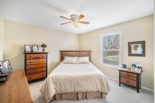 5489 Hidden Oak Cir, Linden, MI 48451 - bedroom with baseboards, ceiling fan, and light carpet