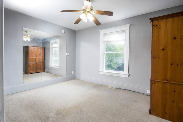 1309 Division St, Port Huron, MI 48060 - unfurnished bedroom featuring carpet flooring, baseboards, and ceiling fan