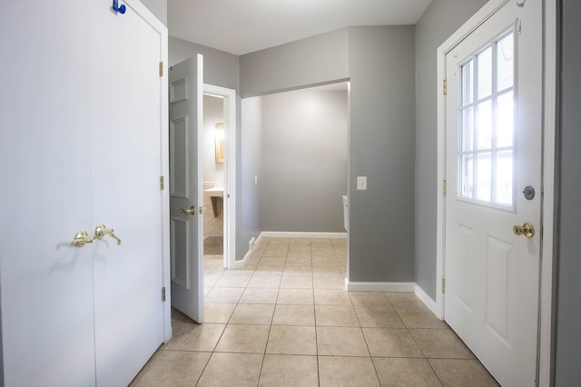 1309 Division St, Port Huron, MI 48060 - doorway to outside featuring light tile patterned flooring and baseboards