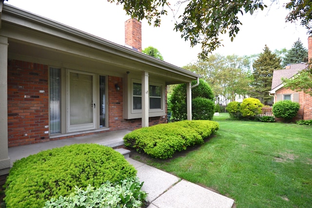2 Cornell Ct, Dearborn, MI 48124 - view of green lawn featuring a porch