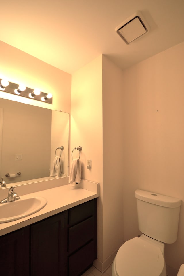 2 Cornell Ct, Dearborn, MI 48124 - half bath with toilet, vanity, and tile patterned floors