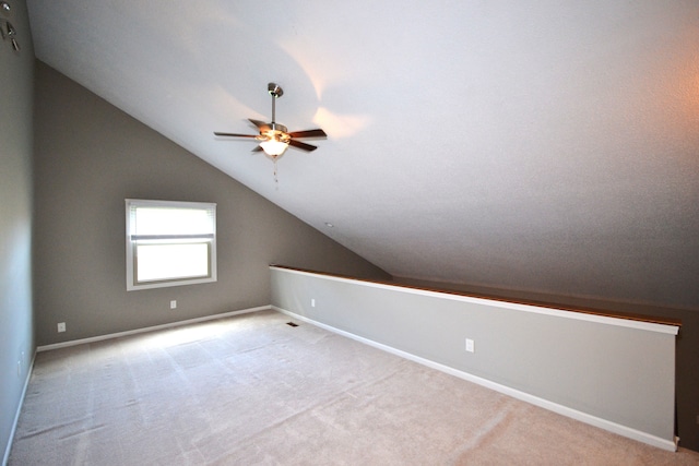 2 Cornell Ct, Dearborn, MI 48124 - additional living space with lofted ceiling, ceiling fan, carpet, and baseboards