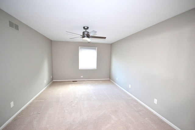 2 Cornell Ct, Dearborn, MI 48124 - empty room with ceiling fan, light colored carpet, and baseboards