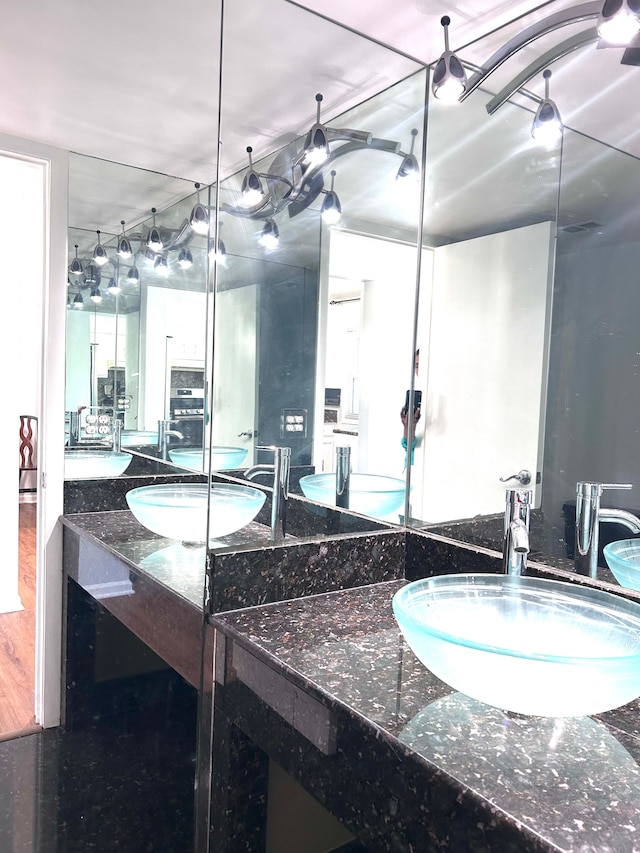 1840 Brentwood Dr, Troy, MI 48098 - full bathroom with vanity and wood finished floors