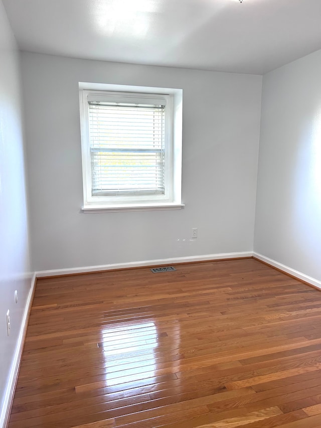 1840 Brentwood Dr, Troy, MI 48098 - empty room with hardwood / wood-style floors and baseboards