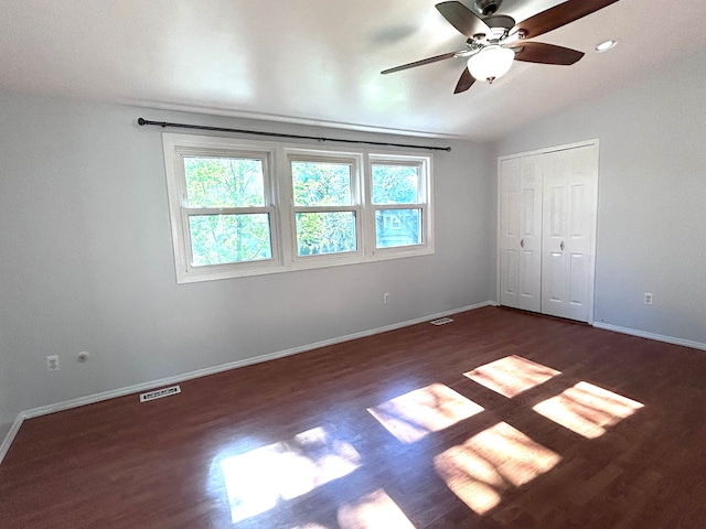 1840 Brentwood Dr, Troy, MI 48098 - unfurnished bedroom featuring wood finished floors, baseboards, lofted ceiling, a ceiling fan, and a closet