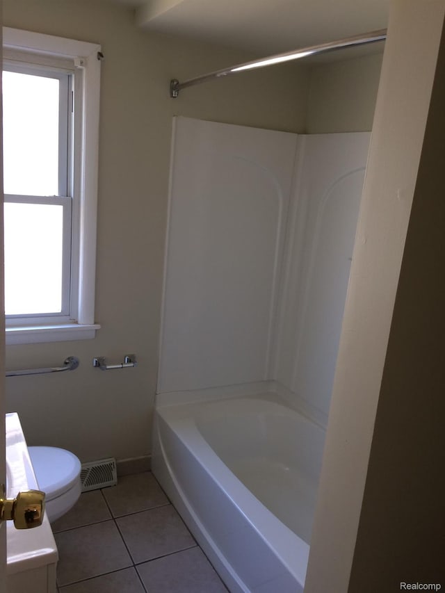 164 W Morehouse Ave N, Hazel Park, MI 48030 - bathroom with tile patterned flooring, toilet, vanity, and  shower combination