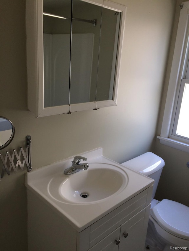 164 W Morehouse Ave N, Hazel Park, MI 48030 - bathroom featuring vanity and toilet