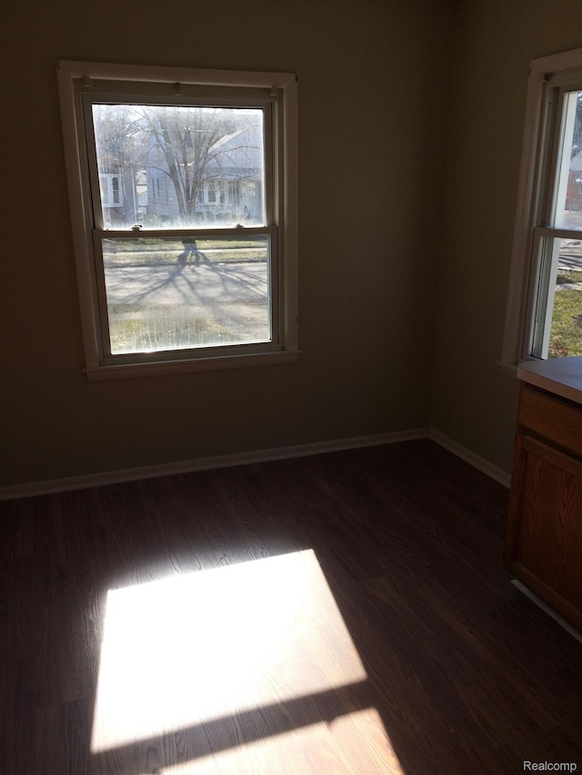 164 W Morehouse Ave N, Hazel Park, MI 48030 - empty room with wood finished floors and baseboards