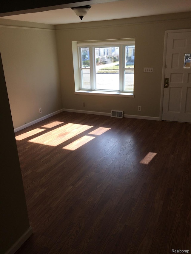 164 W Morehouse Ave N, Hazel Park, MI 48030 - empty room featuring dark wood finished floors and baseboards