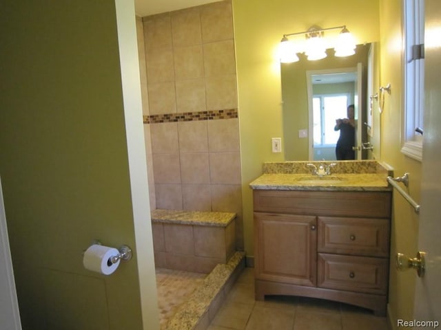6850 Arlington, West Bloomfield, MI 48322 - bathroom with tile patterned flooring, vanity, and tiled shower