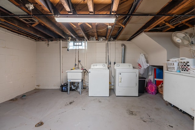 7044 Continental Ave, Warren, MI 48091 - basement featuring washer and clothes dryer and a sink