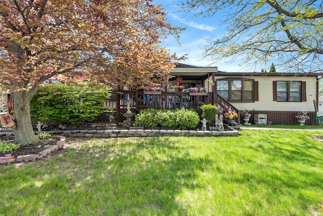 20616 Harmony, Clinton Township, MI 48036 - view of front of house featuring a front yard and a deck