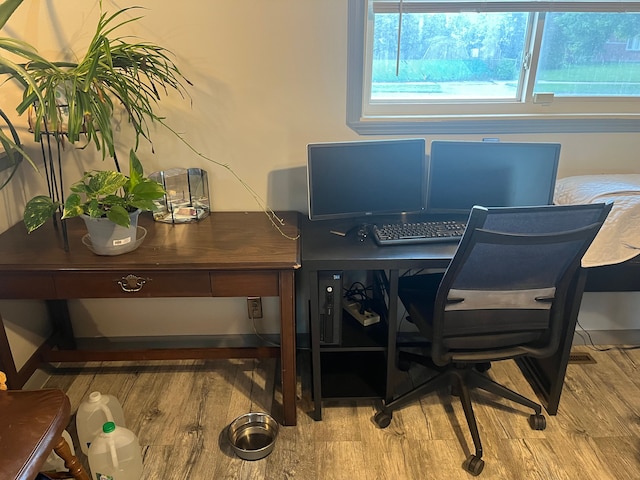 office area with wood finished floors