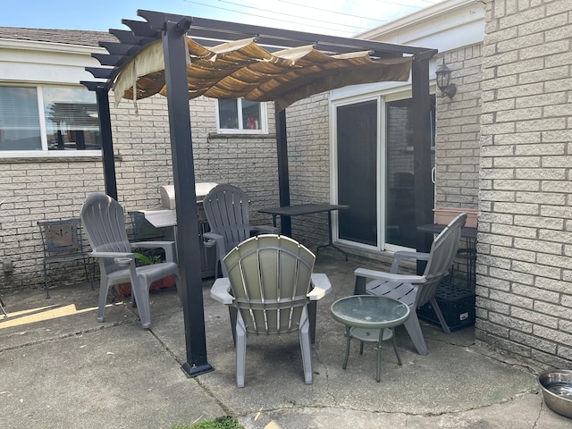 view of patio featuring a pergola