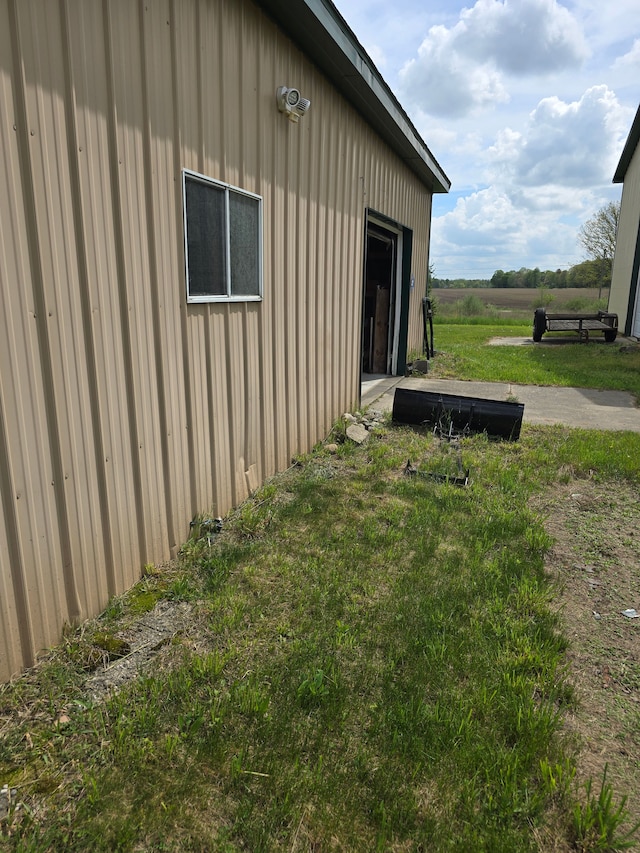 10071 Hillman Rd, Lakeview, MI 48850 - view of side of home featuring a yard