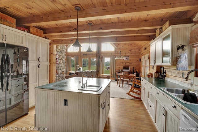 10071 Hillman Rd, Lakeview, MI 48850 - kitchen featuring freestanding refrigerator, dishwasher, light wood-style floors, open floor plan, and a wood ceiling with exposed beams