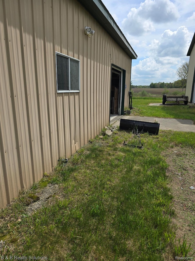 10071 Hillman Rd, Lakeview, MI 48850 - view of home's exterior featuring a lawn
