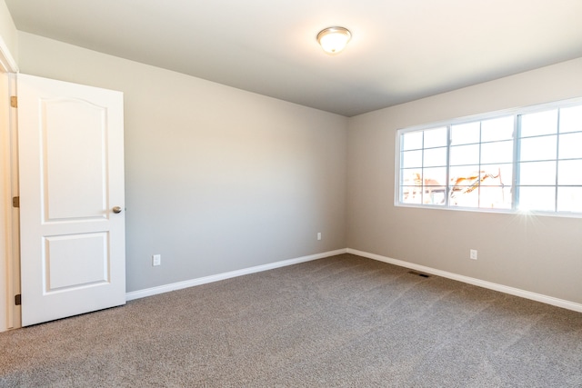 49681 Manistee Dr Unit 86, Chesterfield, MI 48047 - unfurnished room featuring carpet and baseboards
