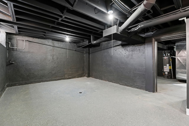 5027 Audubon Rd, Detroit, MI 48224 - unfinished basement featuring water heater