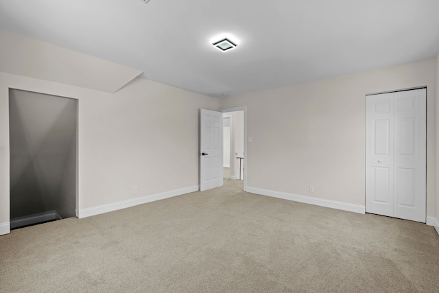 5027 Audubon Rd, Detroit, MI 48224 - unfurnished bedroom with carpet floors and baseboards