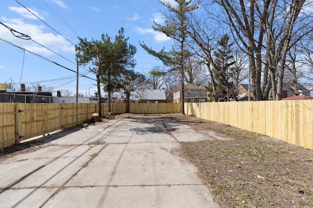 5027 Audubon Rd, Detroit, MI 48224 - fenced backyard featuring a patio area