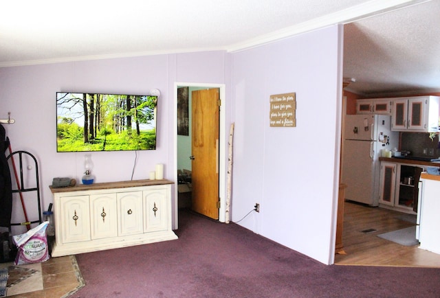 392 Hunters Rill, Oxford, MI 48371 - living room with crown molding and carpet flooring