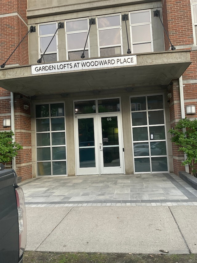 66 Winder St Unit 325, Detroit, MI 48201 - entrance to property featuring french doors and brick siding