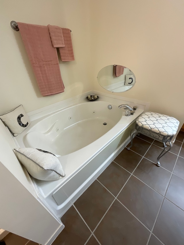 66 Winder St Unit 325, Detroit, MI 48201 - full bathroom with a tub with jets and tile patterned floors