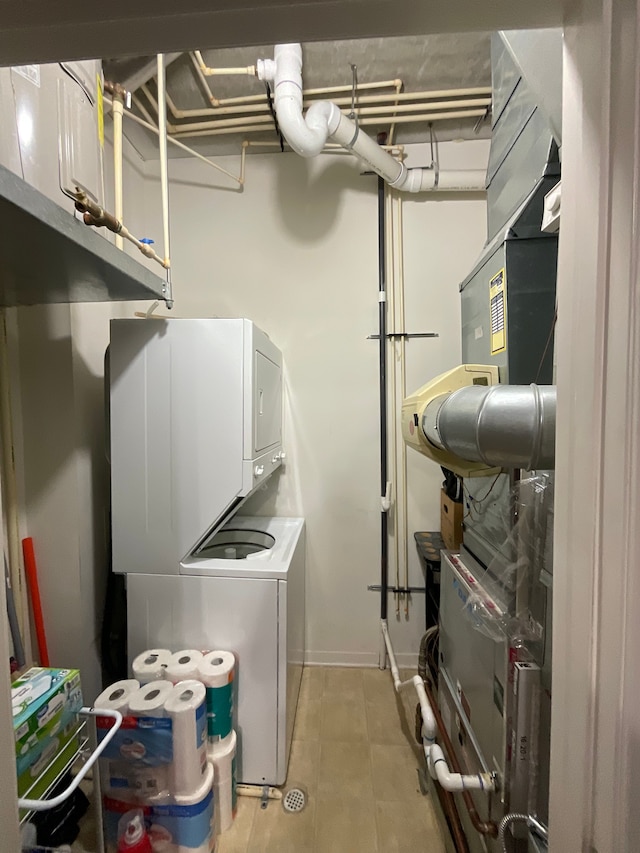 66 Winder St Unit 325, Detroit, MI 48201 - washroom with stacked washer / dryer