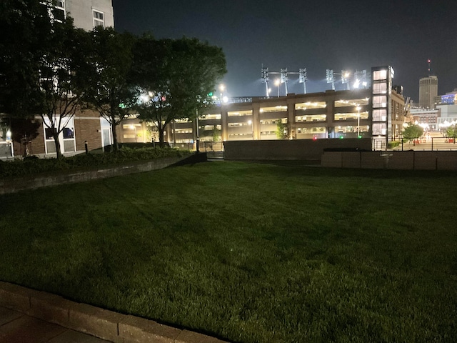 66 Winder St Unit 325, Detroit, MI 48201 - yard at night with a lawn