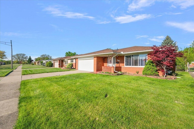 30657 Moulin Ave, Warren, MI 48088 - ranch-style home with an attached garage, driveway, brick siding, and a front lawn