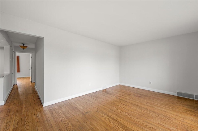 30657 Moulin Ave, Warren, MI 48088 - unfurnished room featuring wood finished floors and baseboards