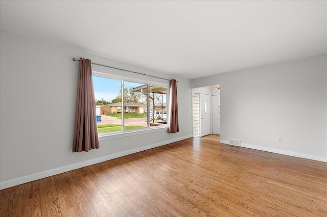 30657 Moulin Ave, Warren, MI 48088 - empty room featuring light wood-style flooring and baseboards