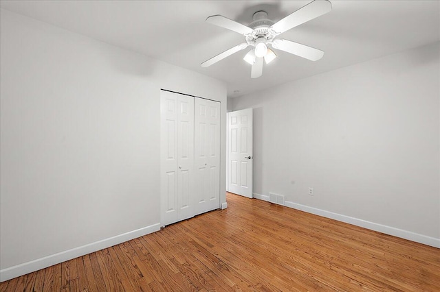30657 Moulin Ave, Warren, MI 48088 - unfurnished bedroom with baseboards, light wood finished floors, a closet, and ceiling fan