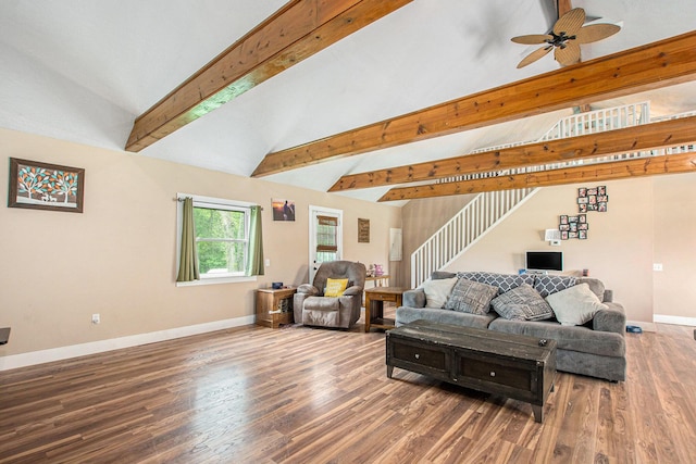 557 W James St, Lawrence, MI 49064 - living area featuring baseboards, wood finished floors, a ceiling fan, and stairway