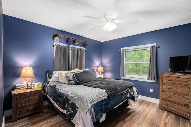 557 W James St, Lawrence, MI 49064 - bedroom with wood finished floors, baseboards, a ceiling fan, and a textured ceiling