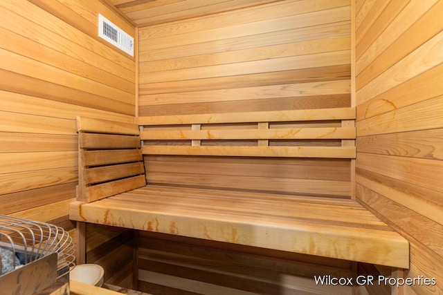 631 Greenslate Dr SE, Ada, MI 49301 - relaxing sauna with wood walls