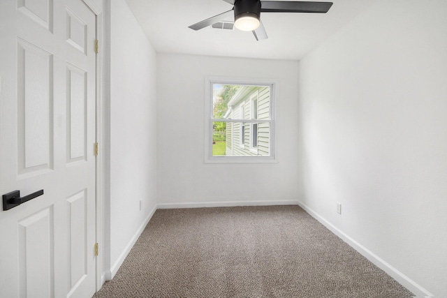 unfurnished bedroom with carpet, baseboards, and a ceiling fan