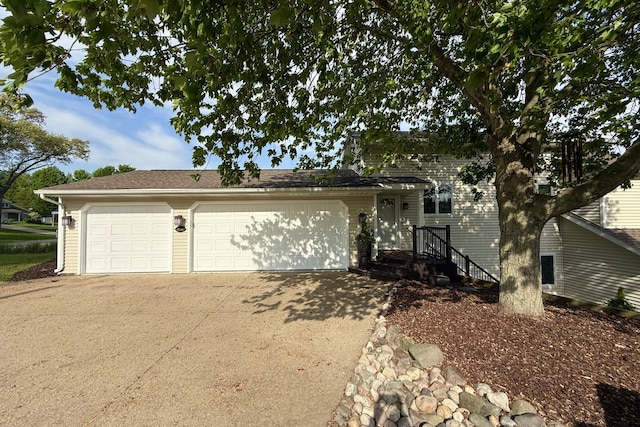 view of front of home with concrete driveway